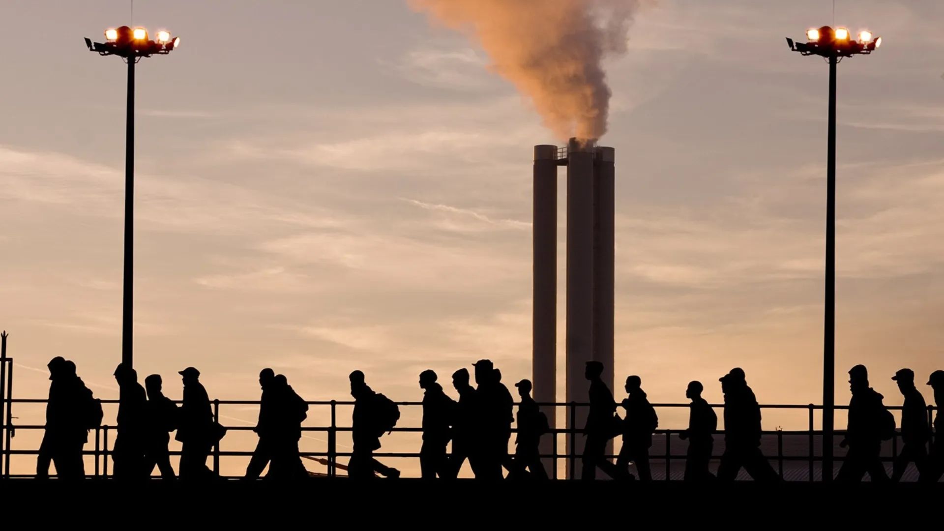 Silhouettes of construction workers.